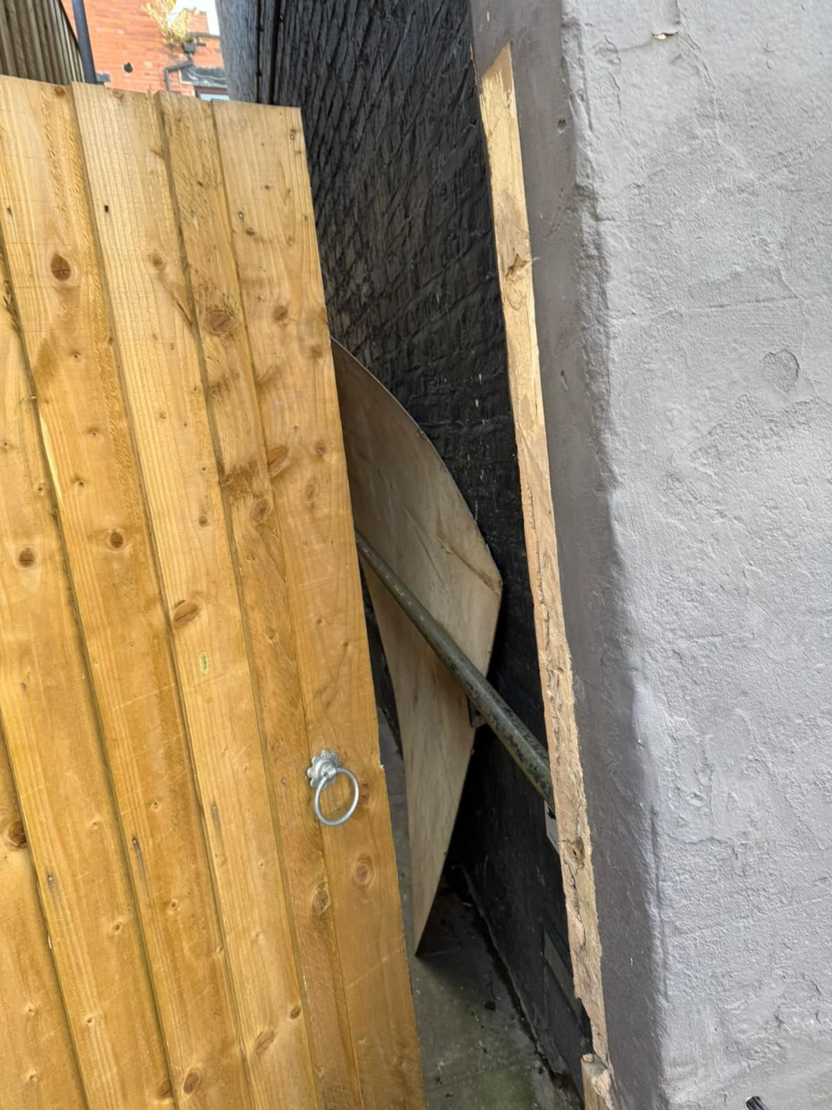 Before: broken gate post