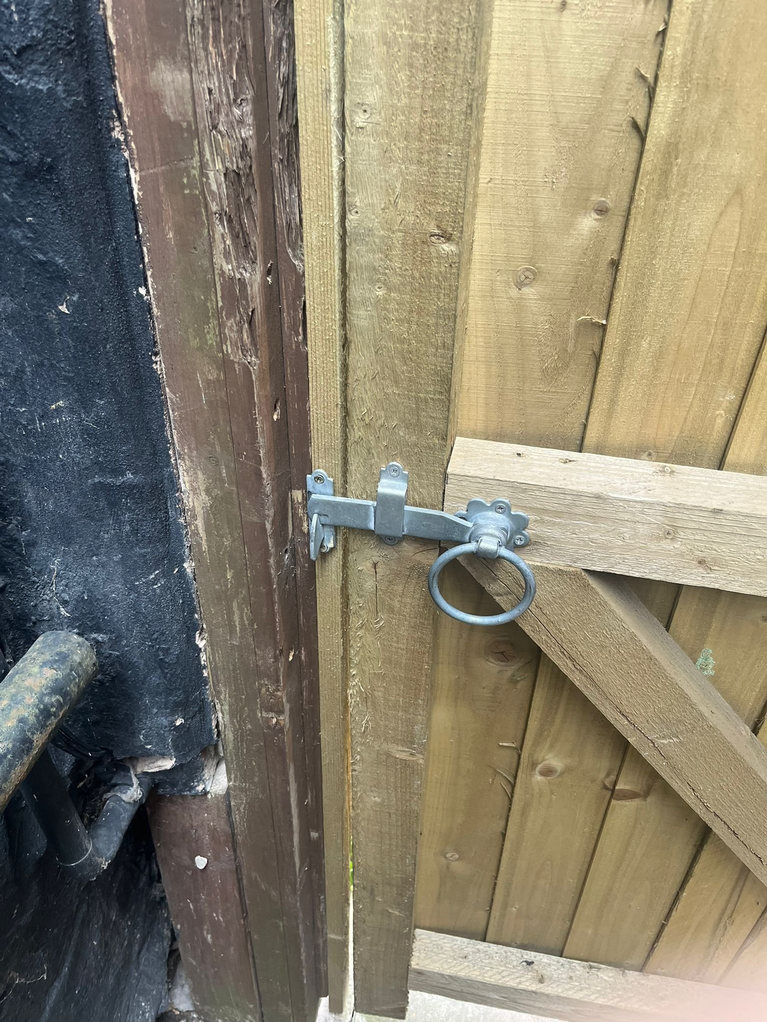 After: repaired gate post
